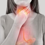 woman with pain in throat